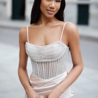 Vestido con corpiño brillante en color champagne - Christian Koehlert